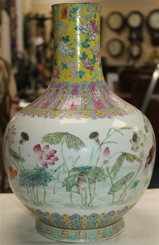 A Chinese famille rose bottle vase, Daoguang seal mark and of the period (1821-50), 36cm, neck reduced, base drilled